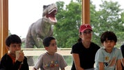 Thirty-one types of life-sized dinosaurs are stomping through backyards -- both terrifying and delighting children -- at the Field Station: Dinosaurs attraction, which opened May  in the New Jersey Meadowlands.